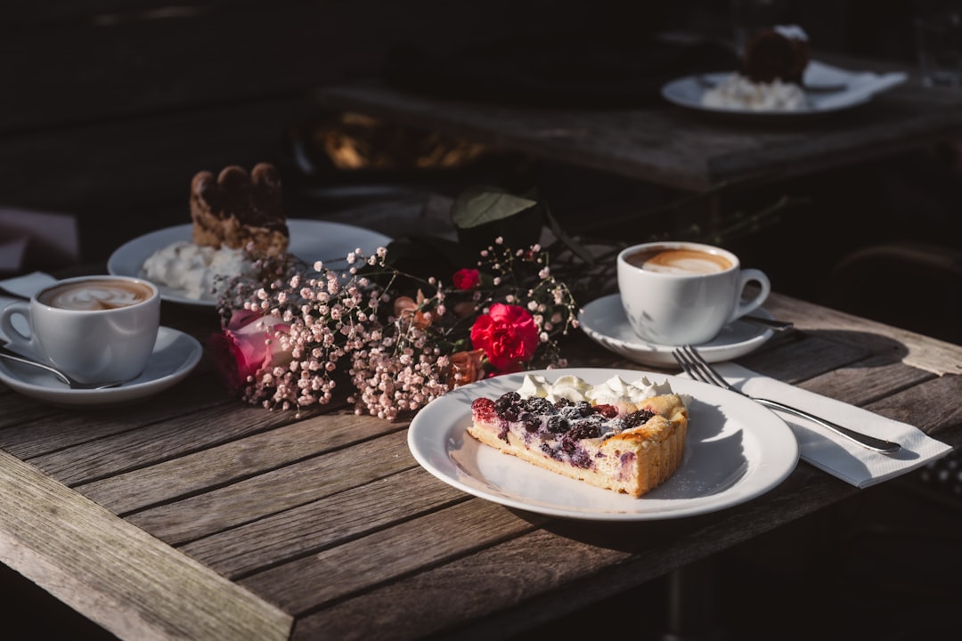 Coffee and blueberry pie on a wooden table