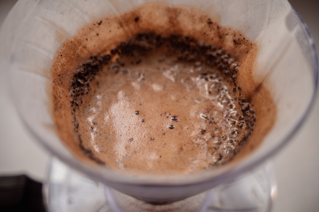 Coffee grounds brewing in a pour-over filter