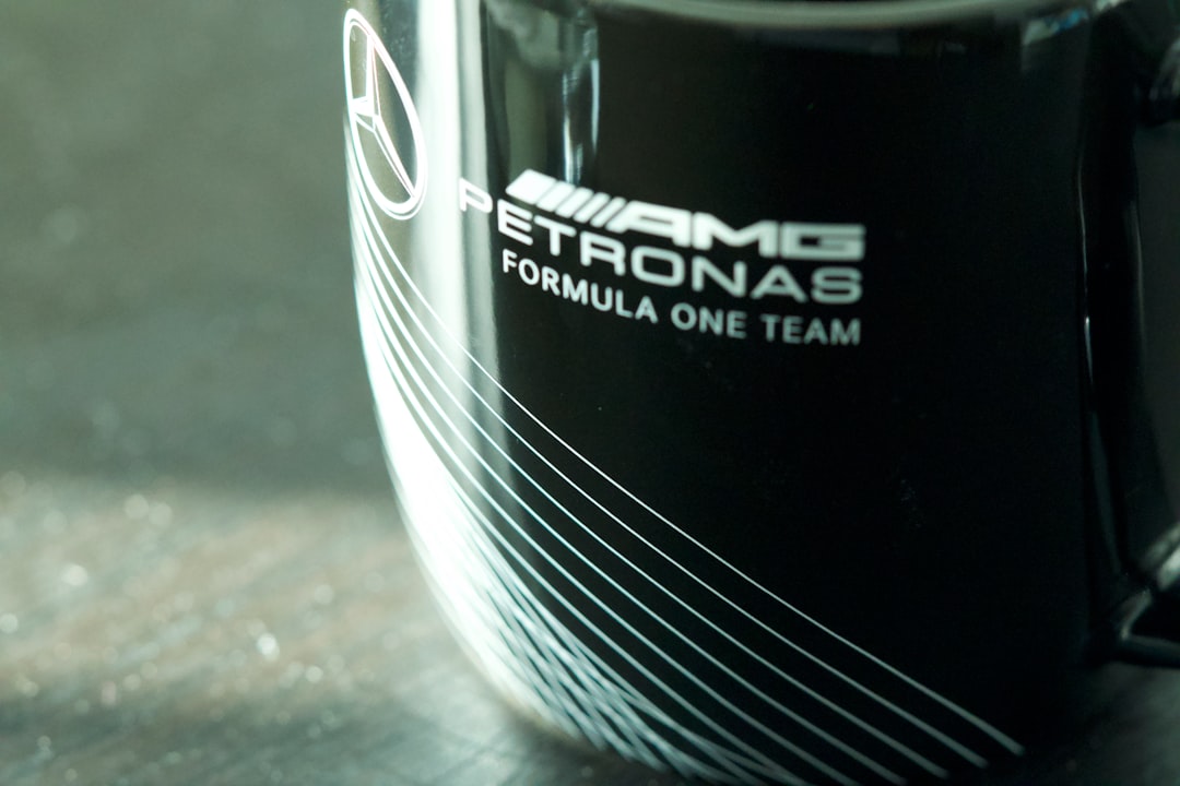 Black mug with petronas formula one team logo