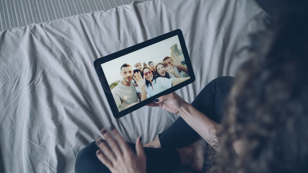 Person video calling with group of friends