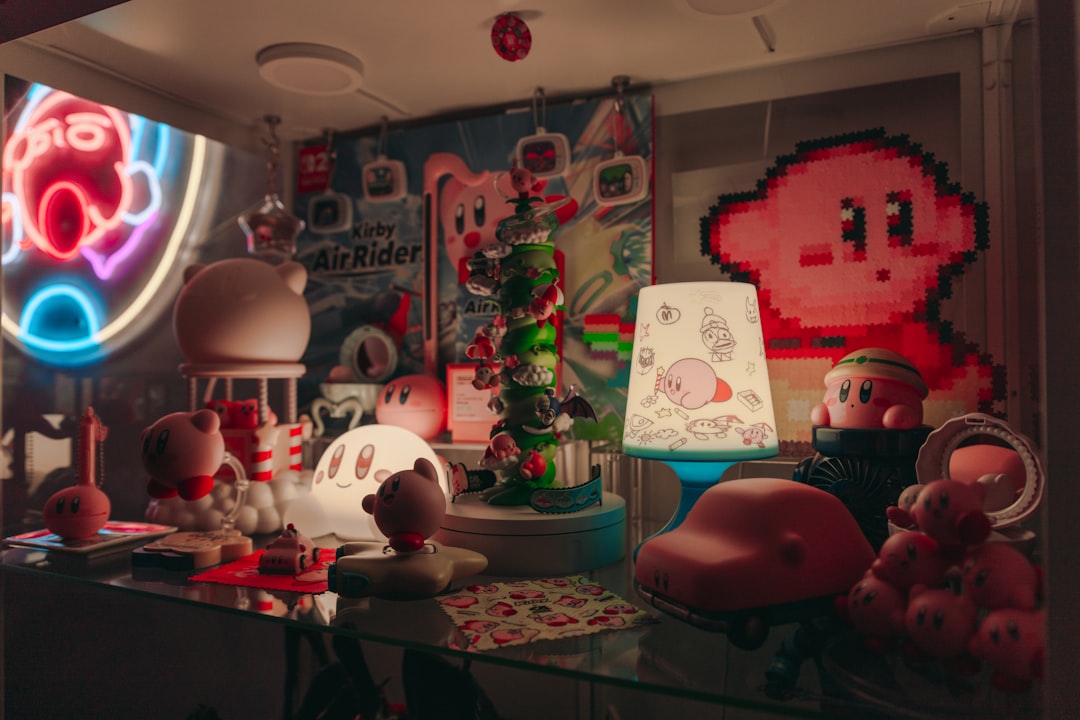 Collection of kirby themed memorabilia and toys